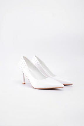 Tacón blanco alto taches traseros