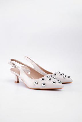 Tacón beige bajo taches