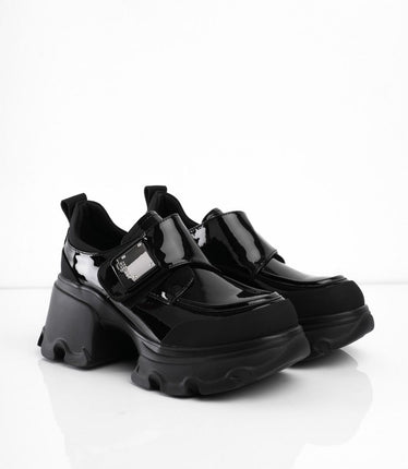 Zapatos negros de charol con aplique plateado