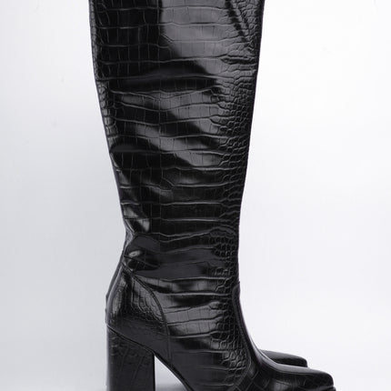 Botas largas negras textura cocodrilo