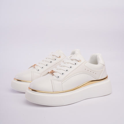 Tenis plataforma blancos con dorado y diseño texturizado