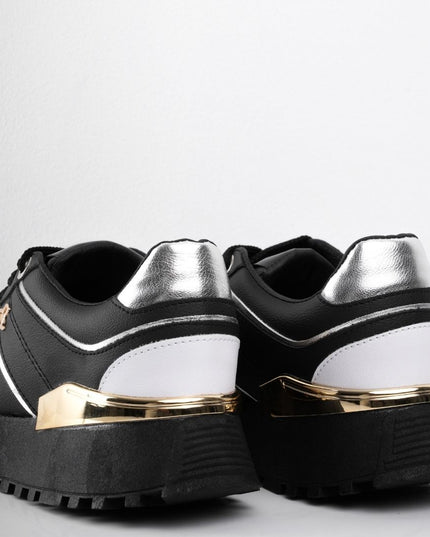 Tenis negros con dorado y plataforma