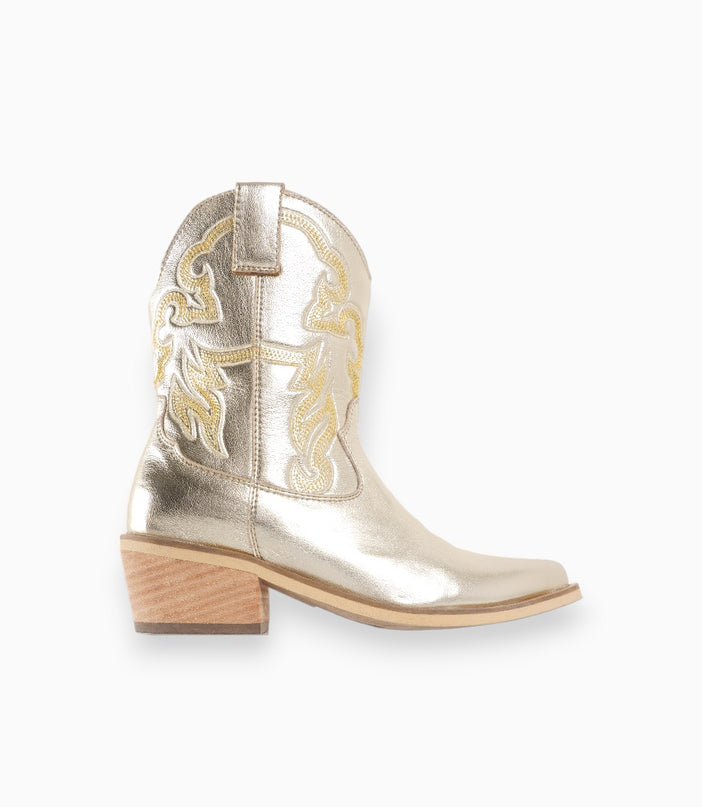 Botas texanas doradas con diseño