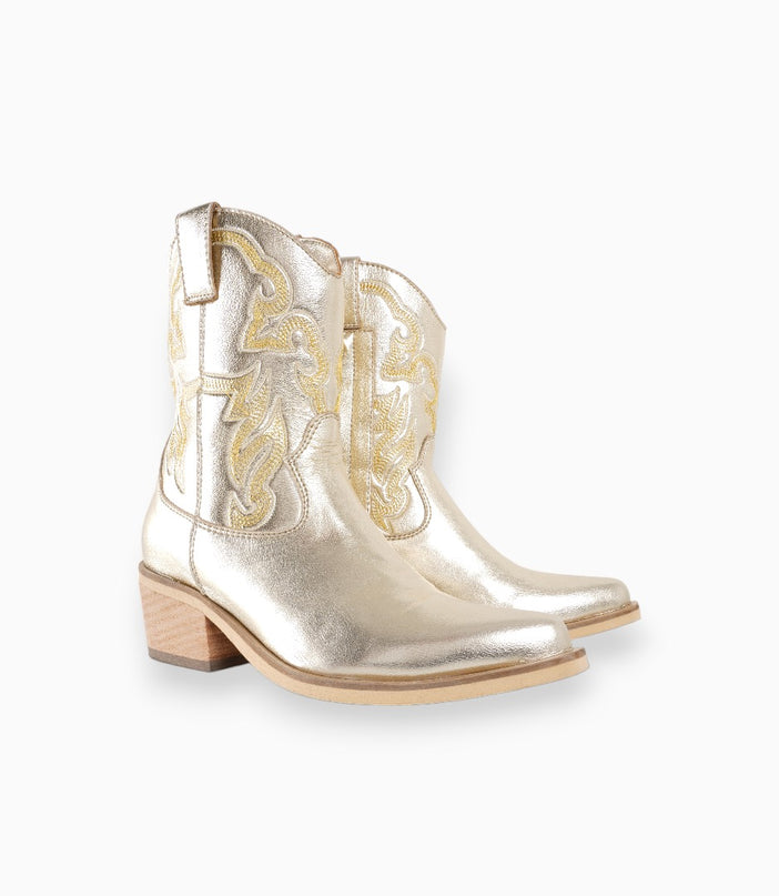 Botas texanas doradas con diseño