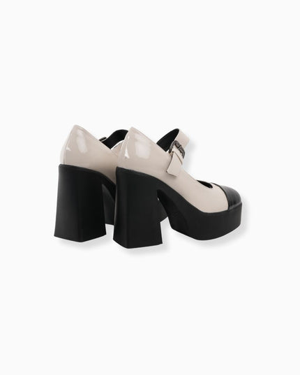 mocasín de tacón hueso con negro