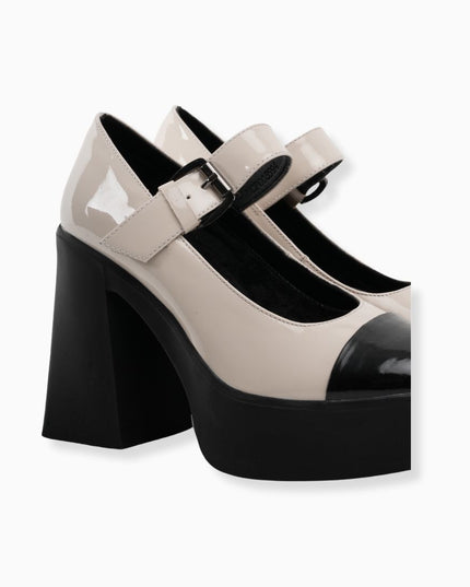 mocasín de tacón hueso con negro