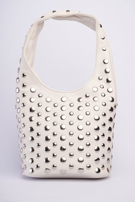 Bolso grande blanco con taches