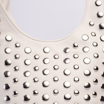 Bolso grande blanco con taches
