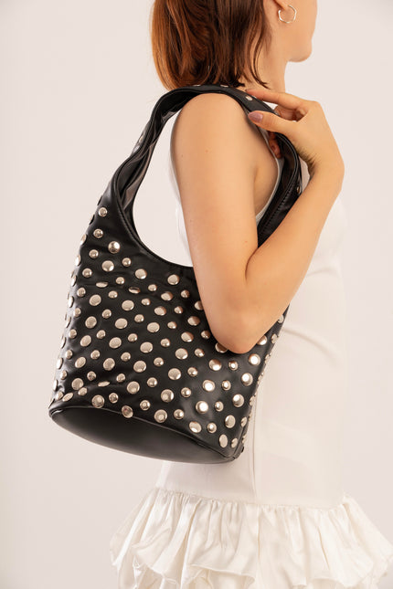 Bolso grande negro con taches