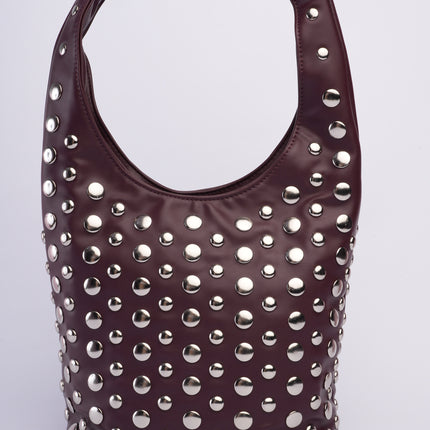 Bolso grande vinotinto con taches