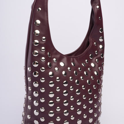 Bolso grande vinotinto con taches
