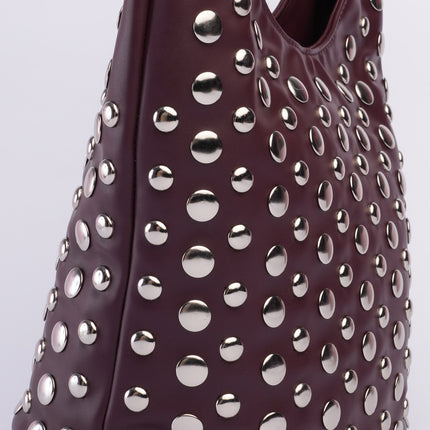 Bolso grande vinotinto con taches