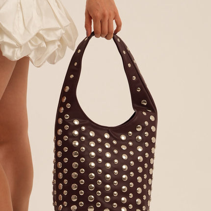 Bolso grande vinotinto con taches