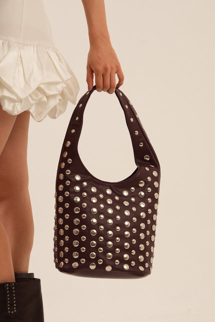 Bolso grande vinotinto con taches