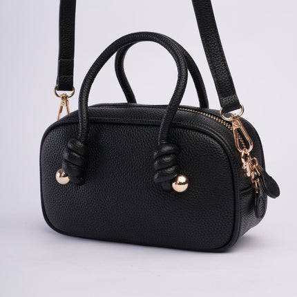 Bolso mini negro con textura