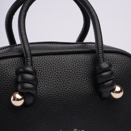 Bolso mini negro con textura