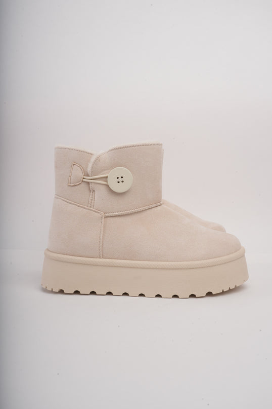 Botas arena de peluche y botón