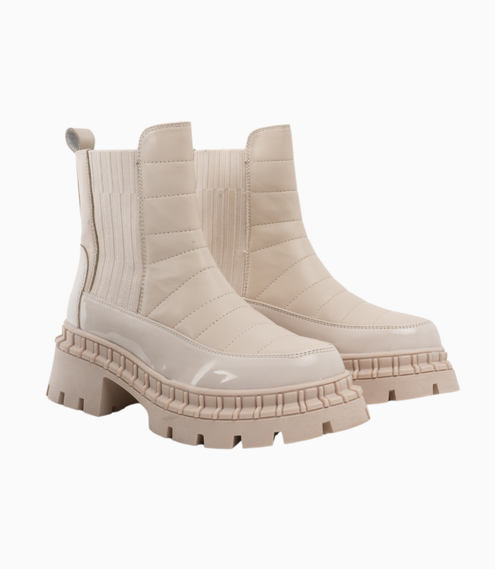 Botines crema con textura acolchada