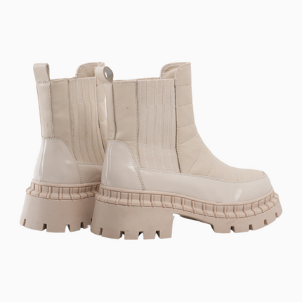 Botines crema con textura acolchada
