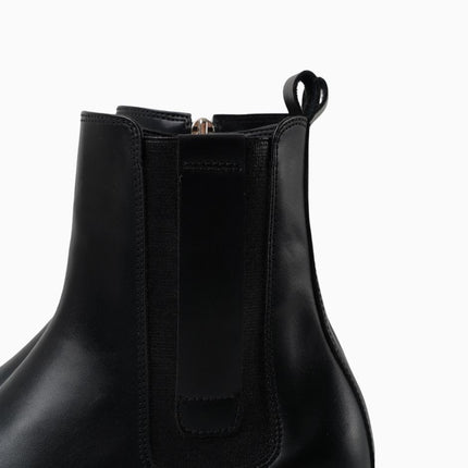 Botines negros planos de elástico lateral