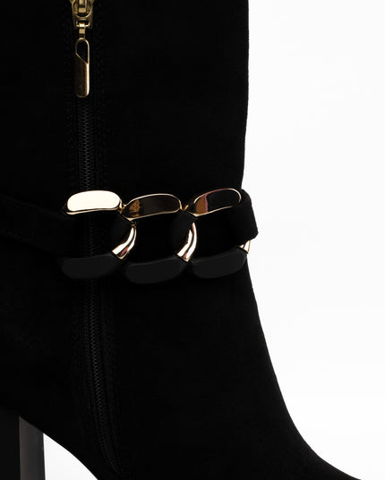 Botines negros altos x cadena brillante