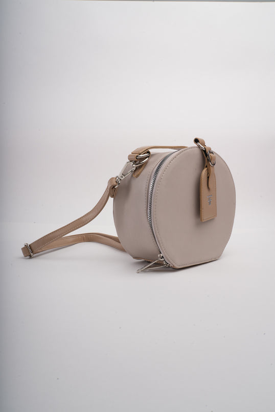 Bolso beige redondo
