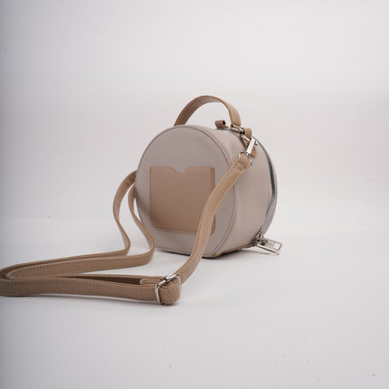 Bolso beige redondo