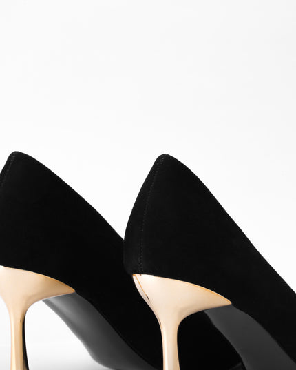 Tacón negro punta dorada