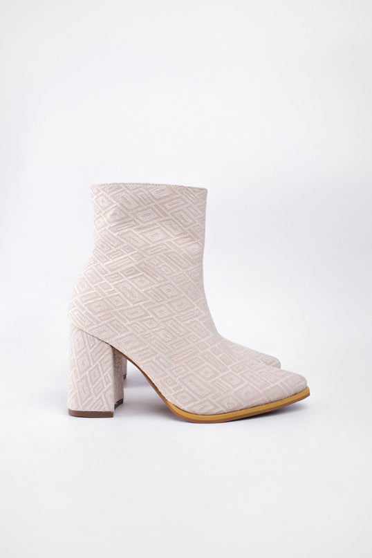 Botines de tacón beige tipo tela