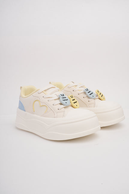 Tenis crema x detalles colores