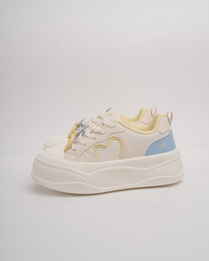 Tenis crema x detalles colores