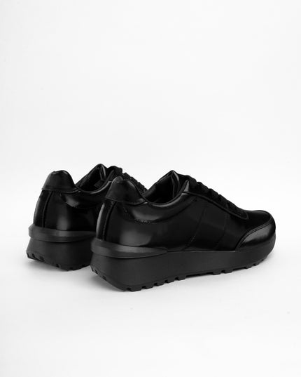 Tenis negros brillantes