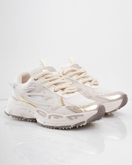 Tenis beige con líneas doradas