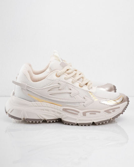 Tenis beige con líneas doradas