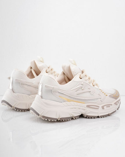 Tenis beige con líneas doradas