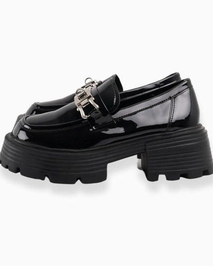 Mocasines negros con plataforma y hebilla plata