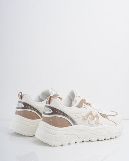 Tenis blancos con detalles dorados y cordones