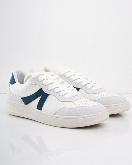 Tenis básicos blancos con líneas azules