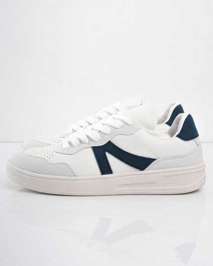 Tenis básicos blancos con líneas azules