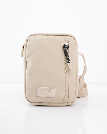 Bolso pequeño beige con cremallera frontal