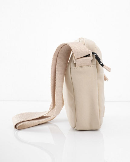 Bolso pequeño beige con cremallera frontal