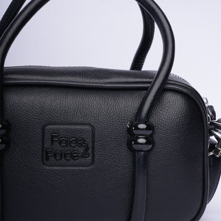 Mini bolso negro en tendencia con correa