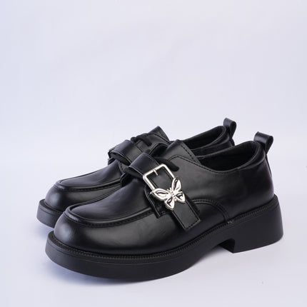 Mocasines elegantes negros con hebilla mariposa