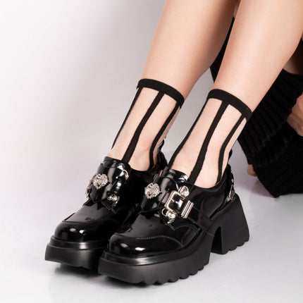 Mocasines negros charol de plataforma y herrajes