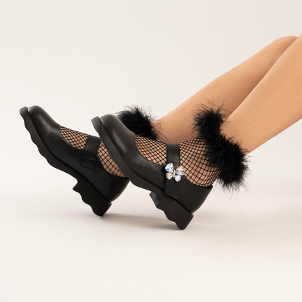 Mocasines negros con aplique mariposa