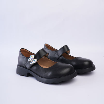 Mocasines negros con aplique mariposa