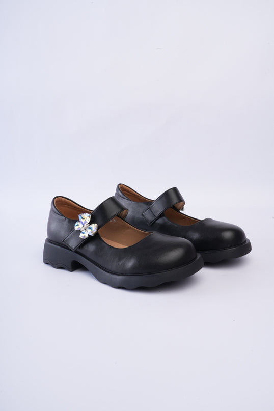 Mocasines negros con aplique mariposa