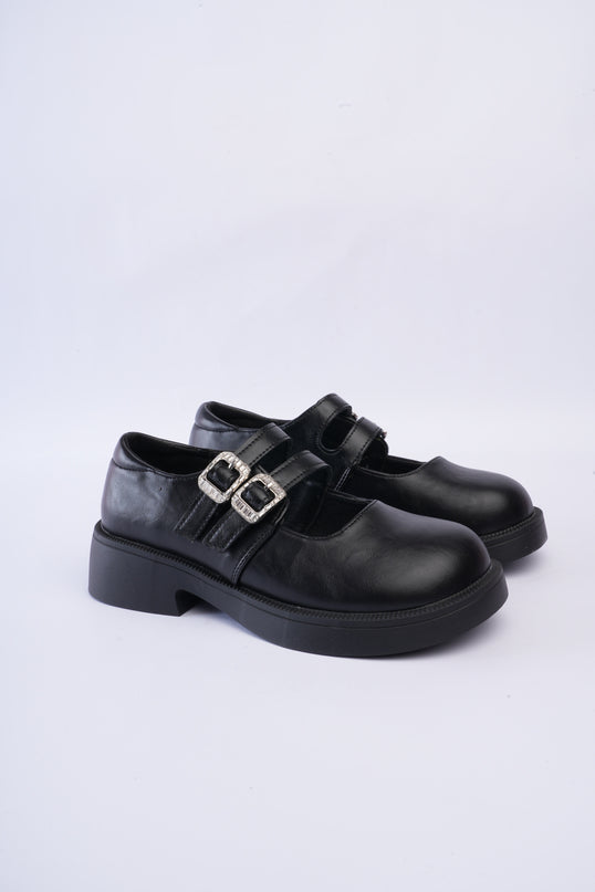 Mocasines negros con doble hebilla