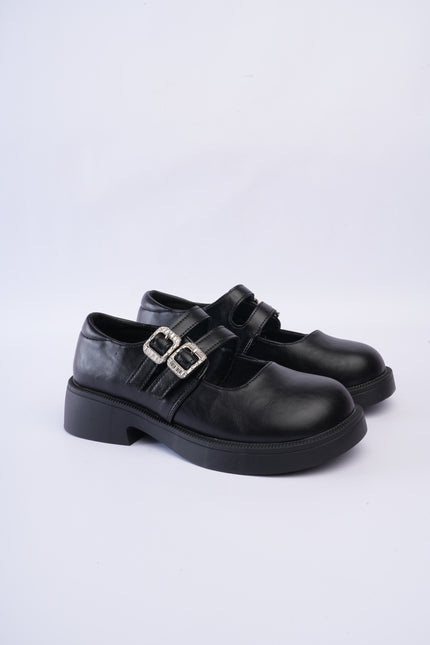 Mocasines negros con doble hebilla