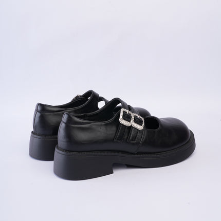 Mocasines negros con doble hebilla